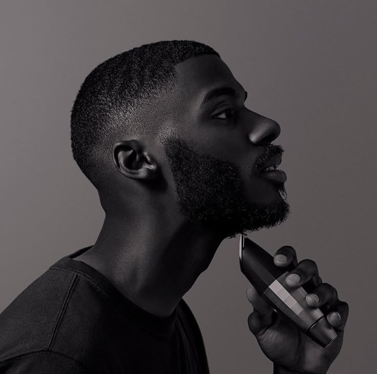 Profile of a sculpted beard trim